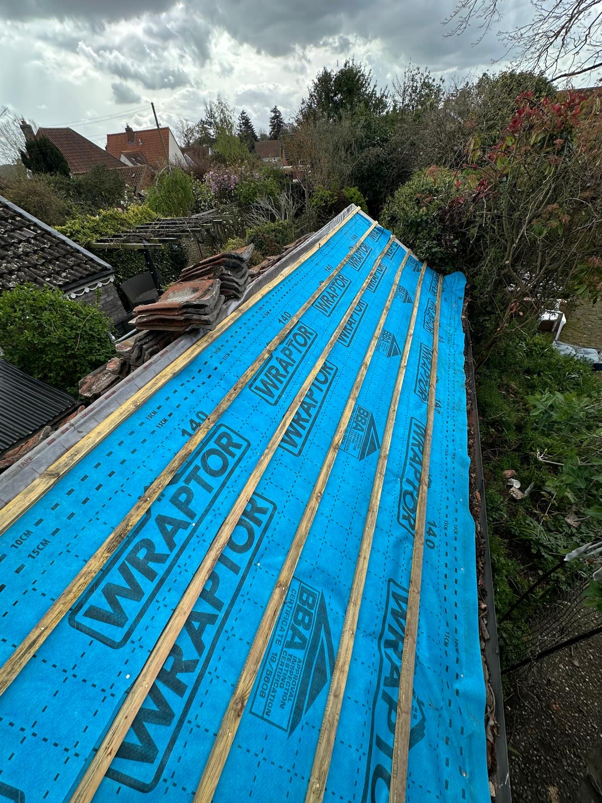 Fresh Wraptor breather membrane and treated battens on a full re-roof