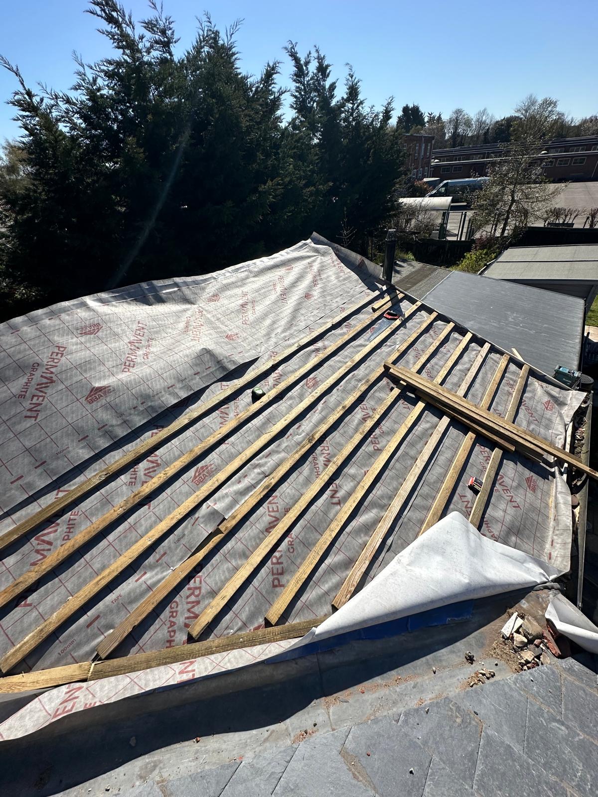 Fresh breather membrane and battens laid out ready for slating