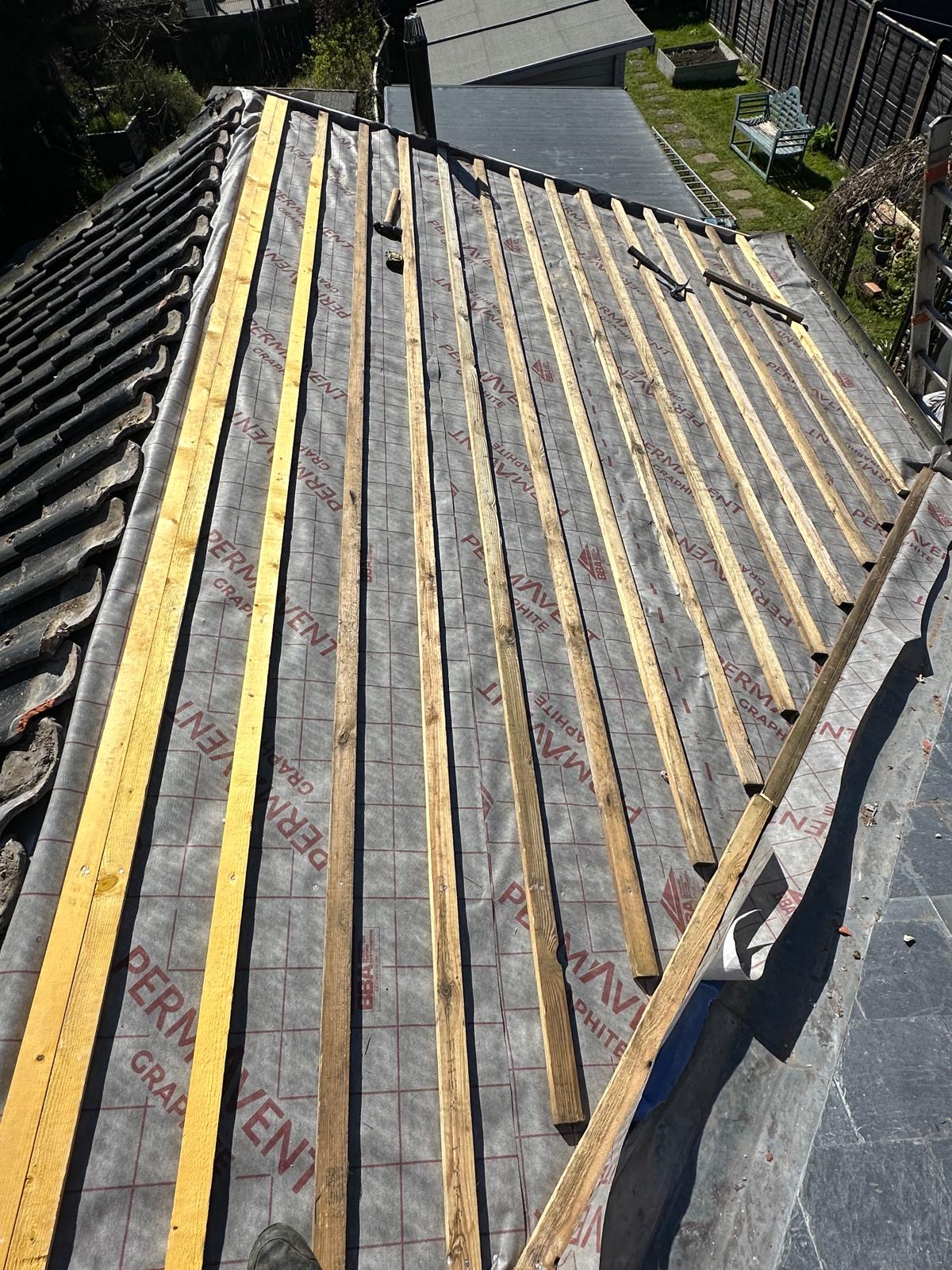Timber roof battens over breather membrane on a full re-roof
