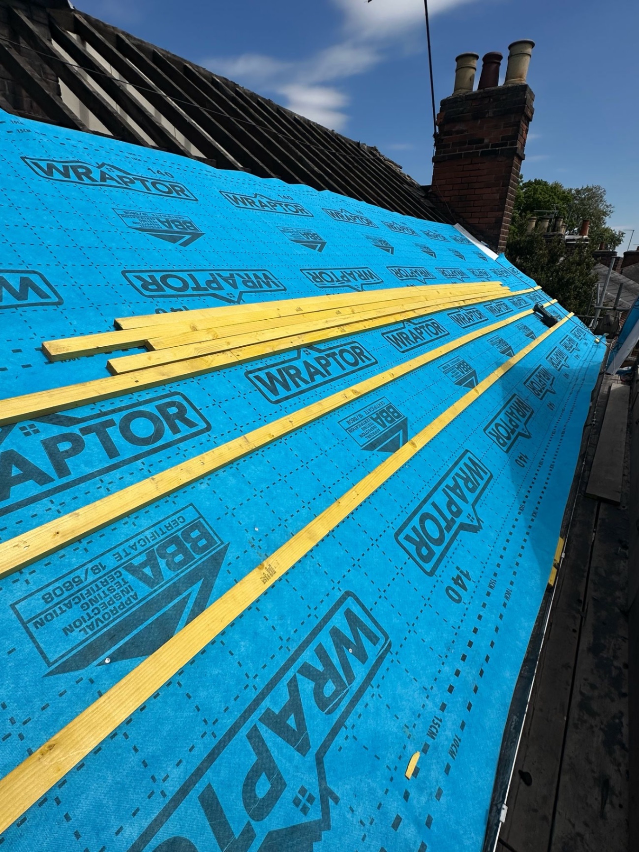 Full pitch of Wraptor membrane with new battens ready for tiles