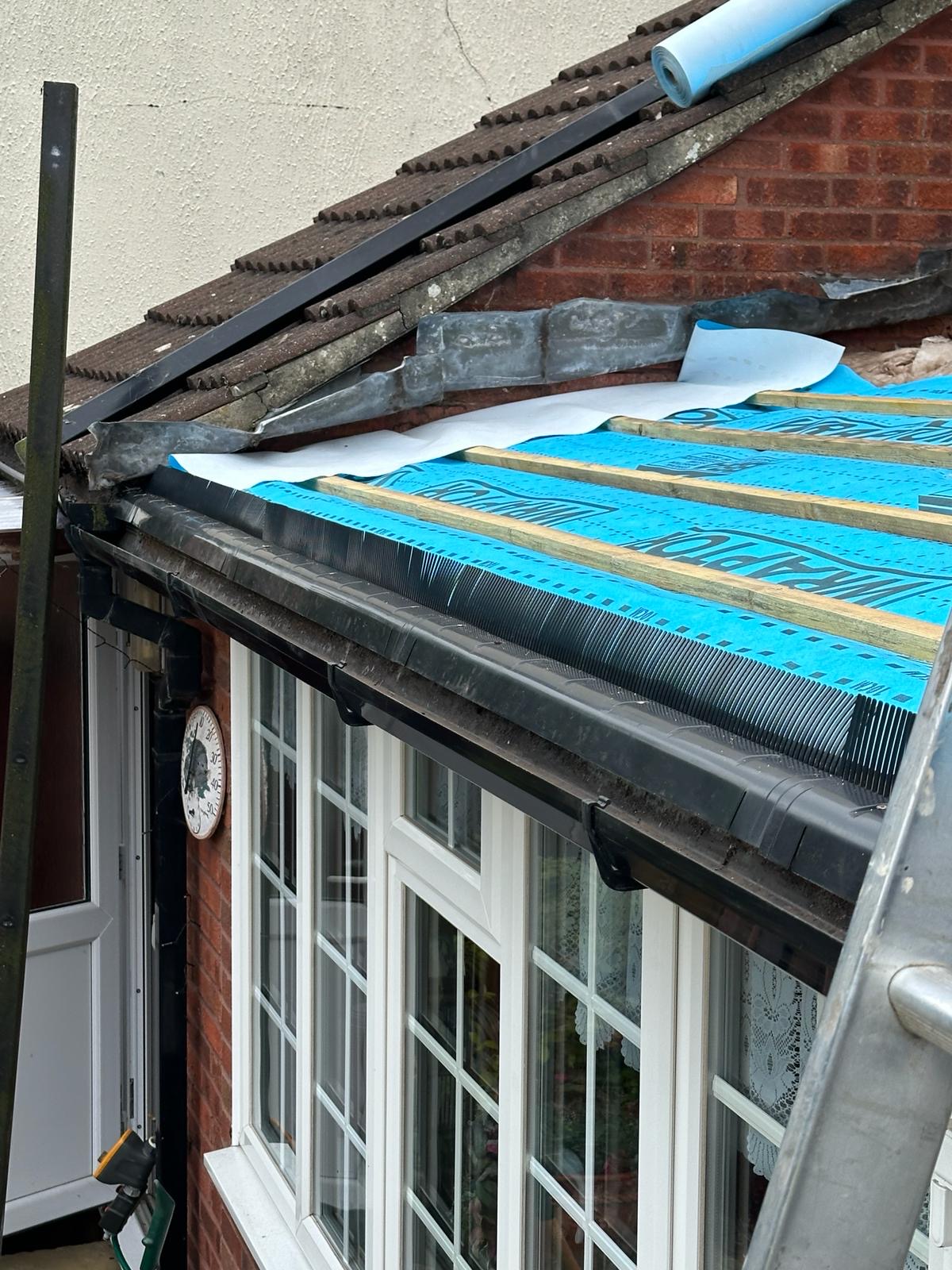 Wraptor membrane laid to eaves with new plastic gutter and vent detail