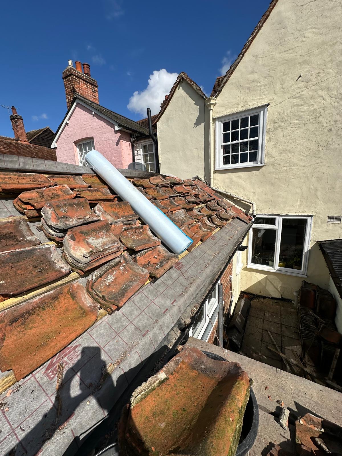 Precision lead flashing around a chimney stack